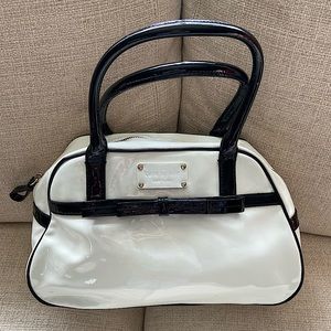 Black and white patent leather Kate Spade bag